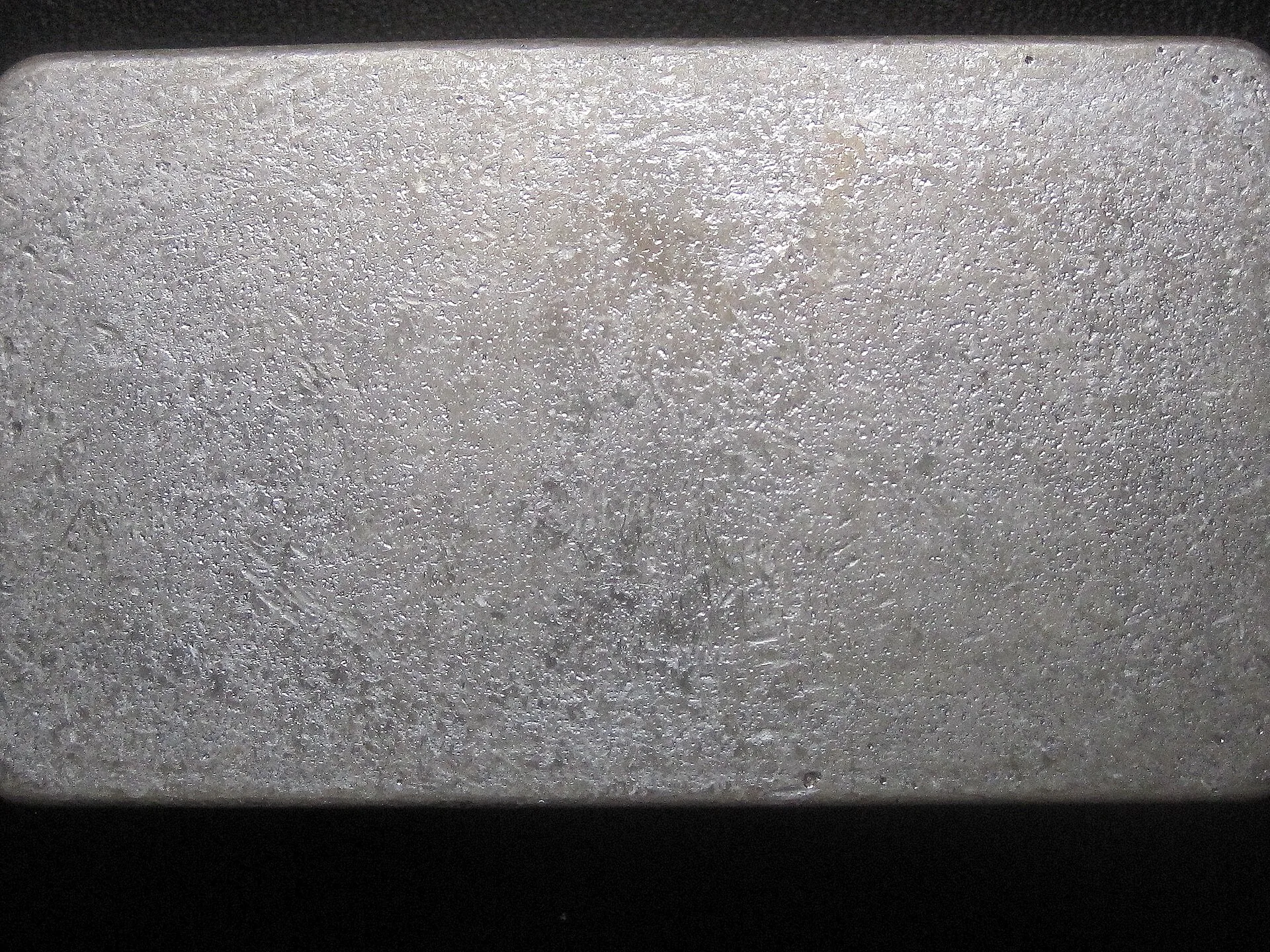 a cast silver bar (Reserve Cast Silver from Scottsdale Silver): dips, ripples, and a satin frost finish. Buying and Storing Physical Silver: Costs, Taxes, Rules