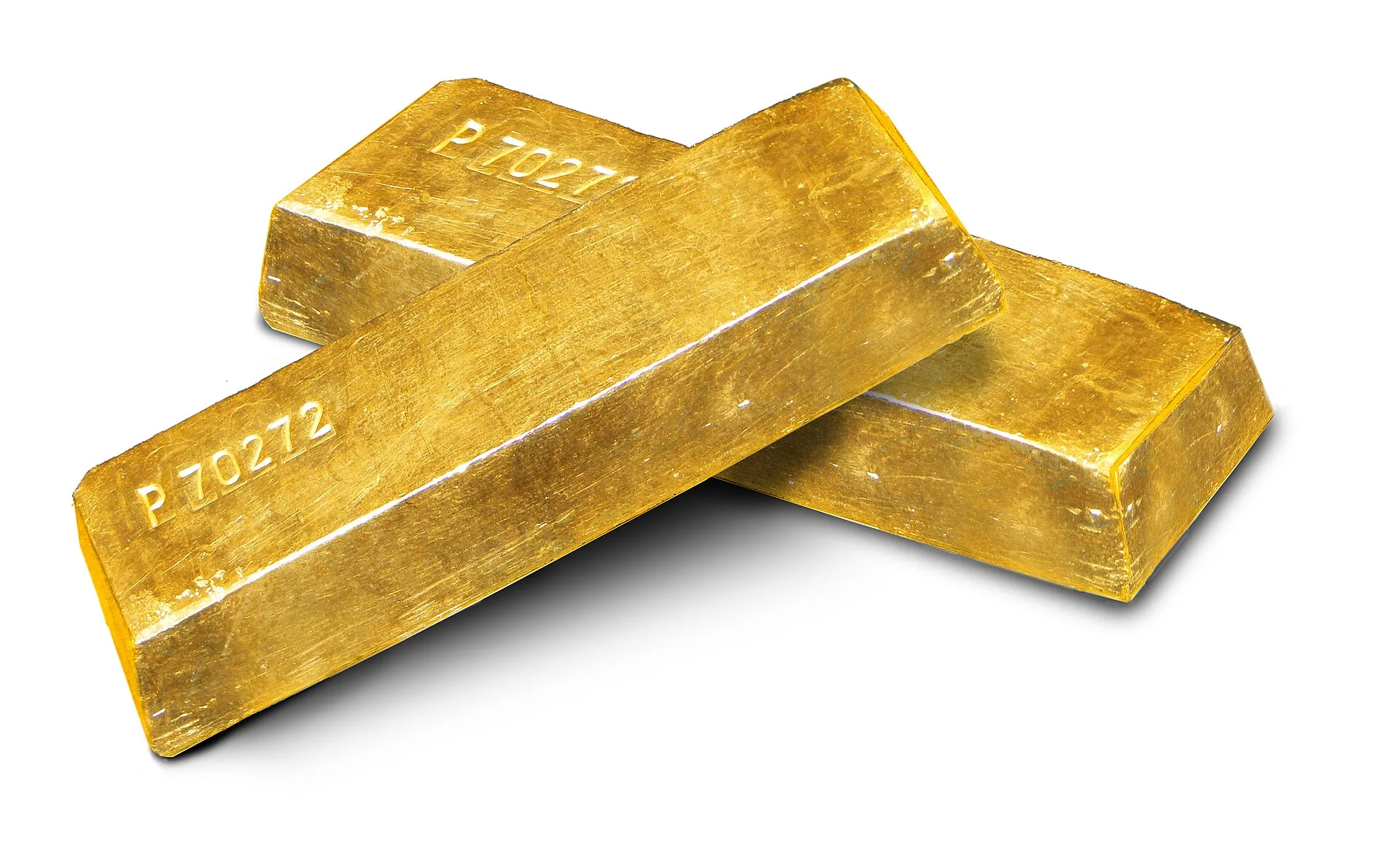 Gold Ingots on white background. How to evaluate bullion dealers in New York City, licenses, complaints and COMEX ties