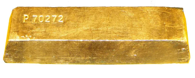 Gold Ingot on white background. First bullion purchase due-diligence checklist