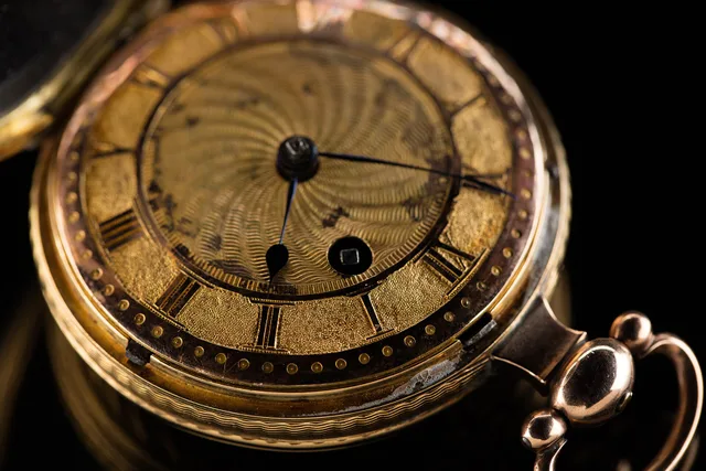 Verge pocket watch, open dial verge watch, key wind through dial, but winding square also on back plate, yellow gold and rose gold dial with engraving, engraved balance cock not pierced, rose gold stirrup bow, bull's eye glass. London hallmarked 1812. Serial number 5240 on name bar. Part of the Appl. Mint, Refiner and Hallmark Checklist: Reading Bullion Marks