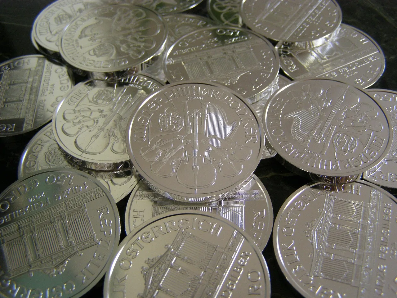 money, coins, silver, metallic, investment, wealth. Building and selling a small silver position case