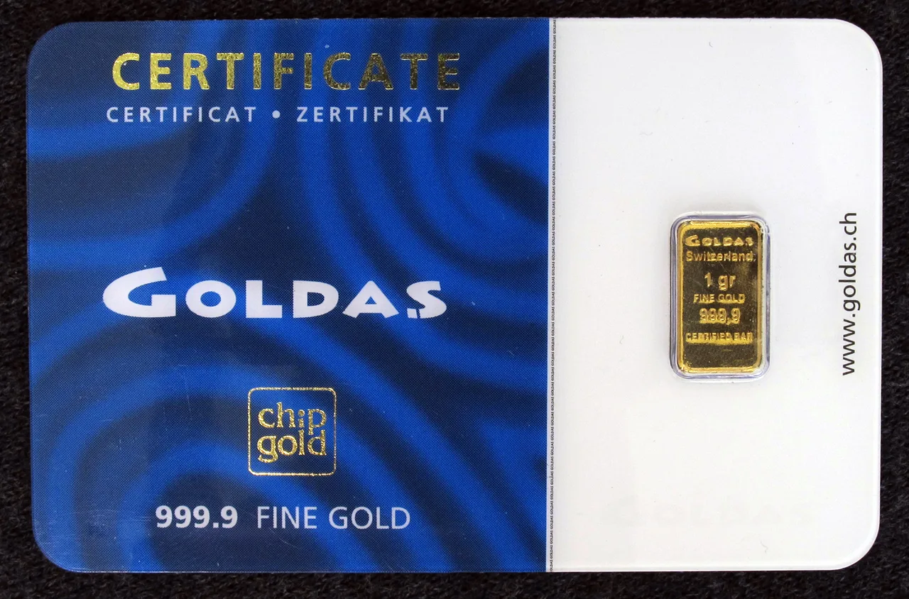A one-gram gold bar sealed in an assay card