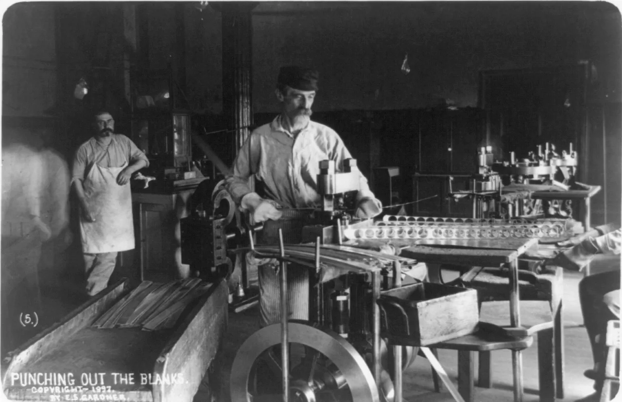 Workers punching coin blanks at the New Orleans Mint in 1897